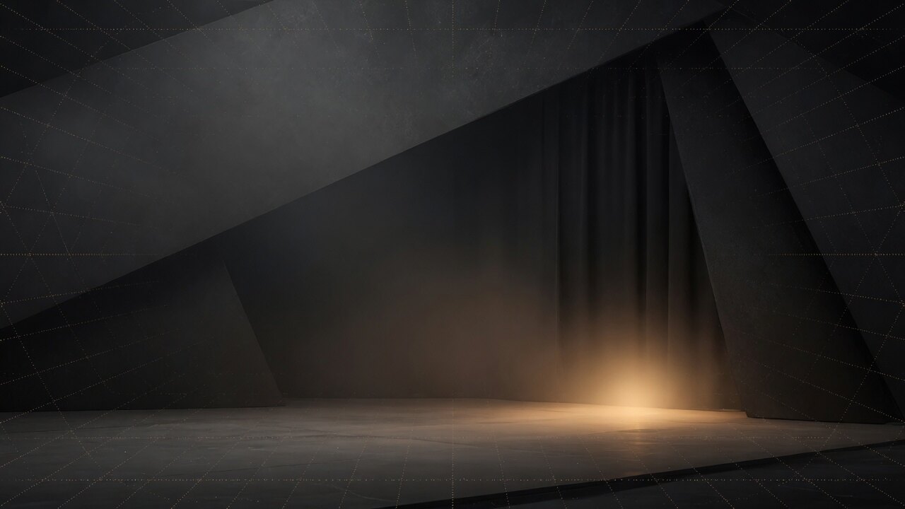 Dark charcoal stage with soft warm accent glow