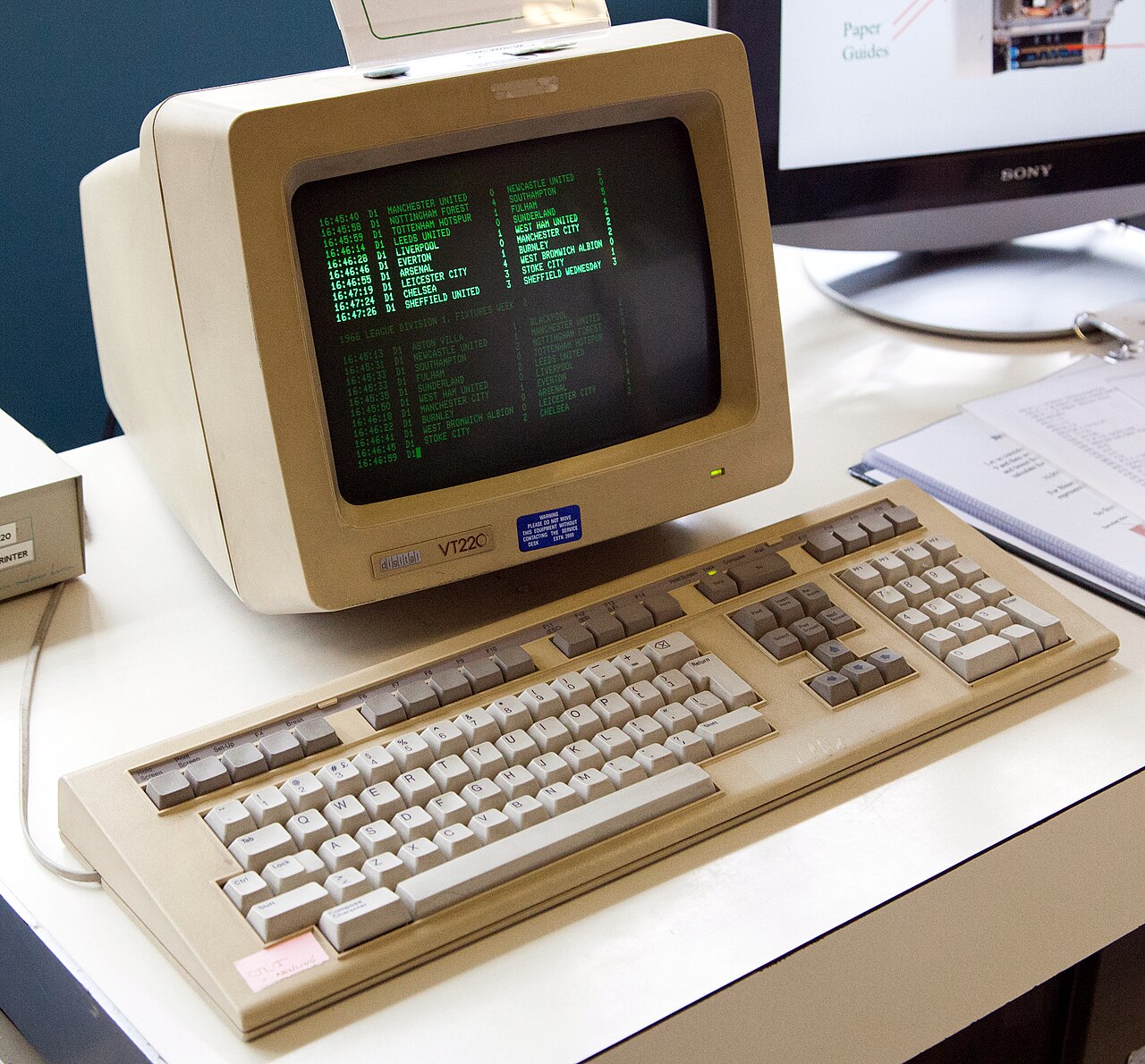 A DEC VT220 displaying green text, providing input and output for a host computer.